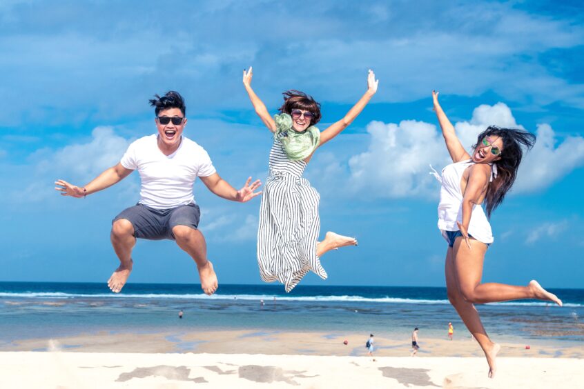 Happy scaled - vacation - Unplugging to Recharge: The Magic Number for Vacation Days | Tamma Capital